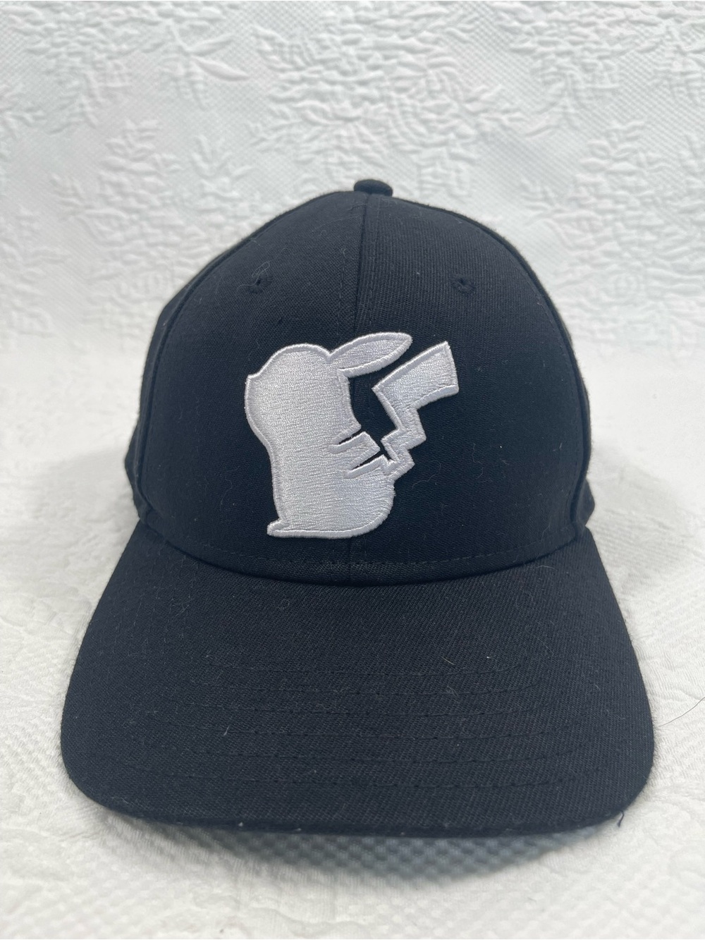 Black Baseball Cap with White Character Patch